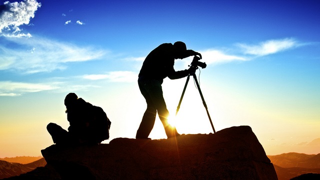 Silhouetted photographers