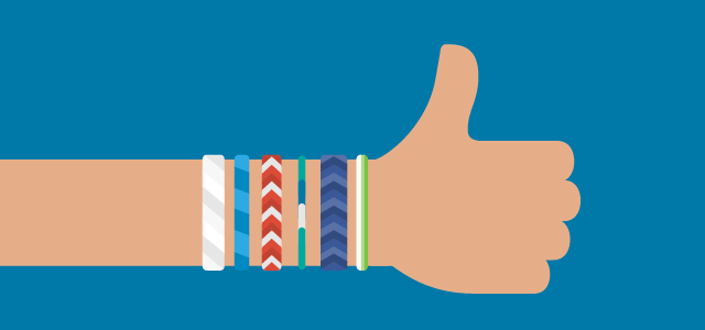 arm wearing friendship bracelets