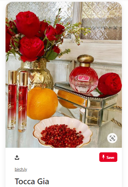 Pin example from Birchbox, featuring a rose-colored perfume bottle and red roses and red pomegranate seeds as red complements to the bottle.