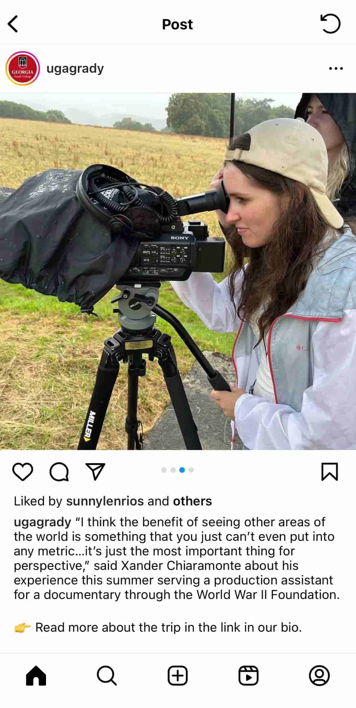 A University of Georgia student looks through a viewfinder during a study abroad trip for Grady College of Journalism and Mass Communication. 