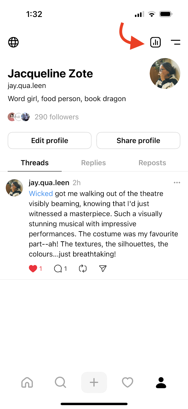 threads mobile app with an arrow pointing to the "insights" icon at the top of the screen