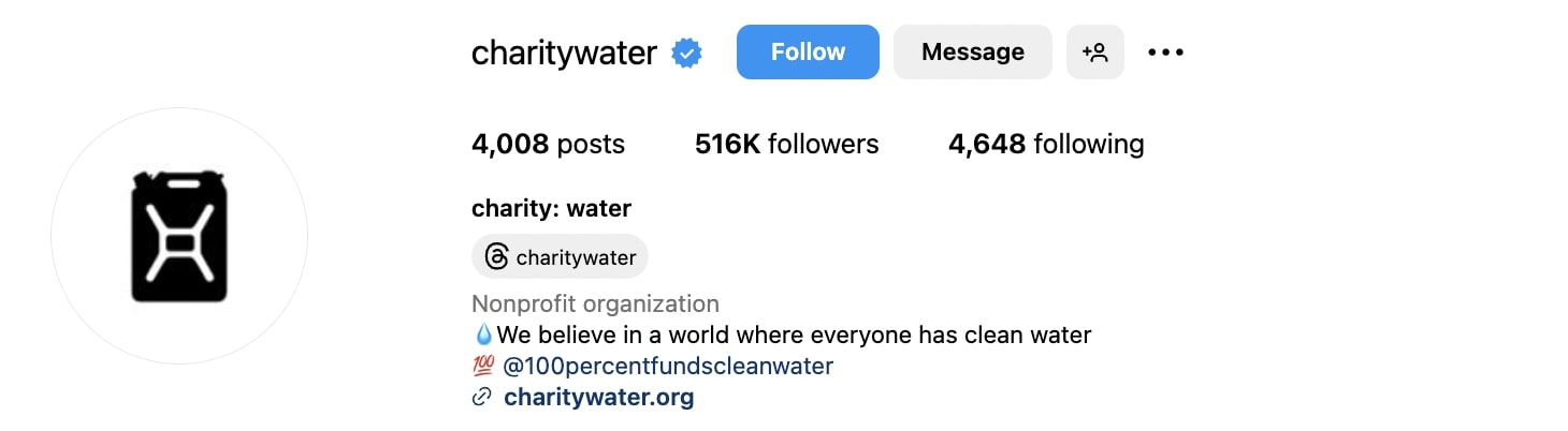 Charity Water Instagram bio that reads "(water drop emoji) We believe in a world where everyone has clean water (hundred points emoji) @100percentfundscleanwater"