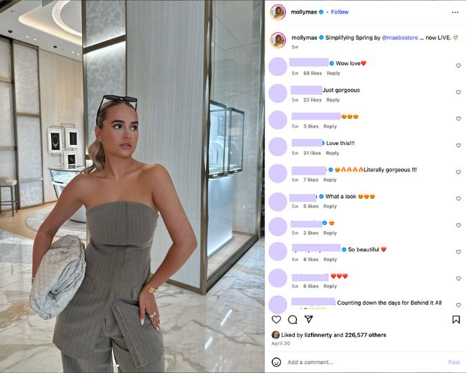 Molly Mae modelling a summer outfit in a hotel lobby