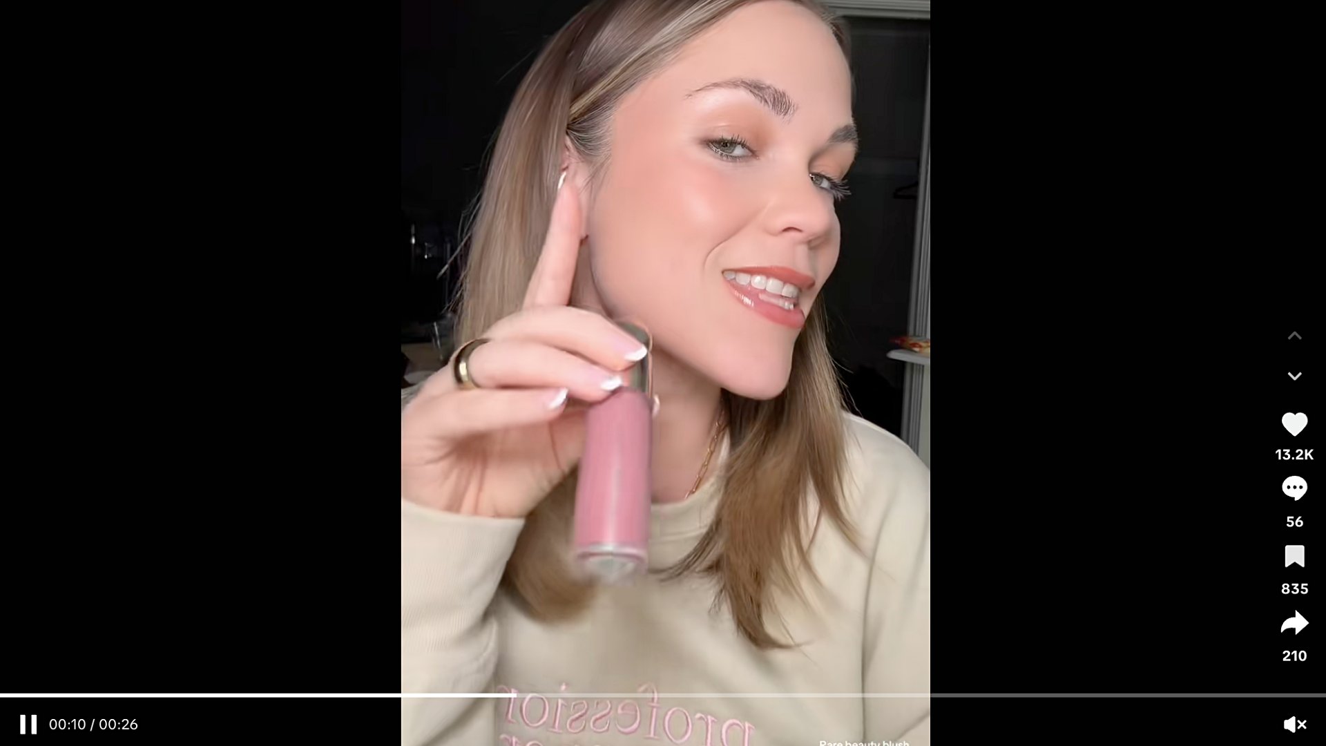 Abbey Kline tries on and reviews Rare Beauty products in a TikTok video.