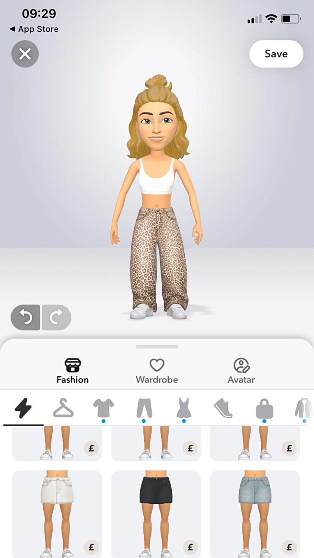 The Bitmoji creator interface shows an avatar in baggy leopard jeans above multiple pant choices and a receipt for the jeans