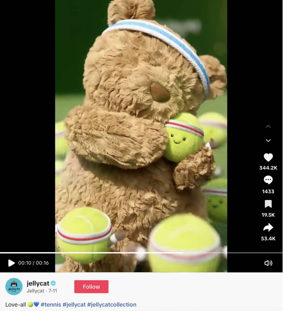 A stop motion TikTok video from Jellycats showing a plush bear hugging a plush tennis ball