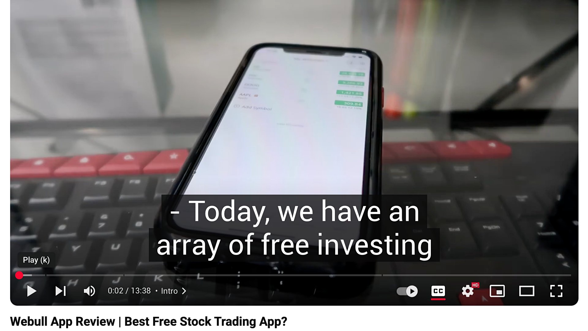 Ryan Scribner shows the Webull app interface in a YouTube video.