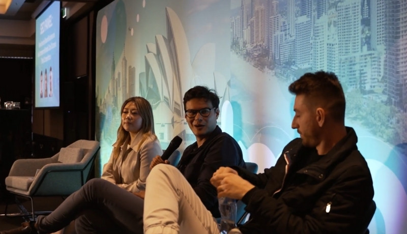 Photo of three speakers onstage at Gold Coast DMA 2023.