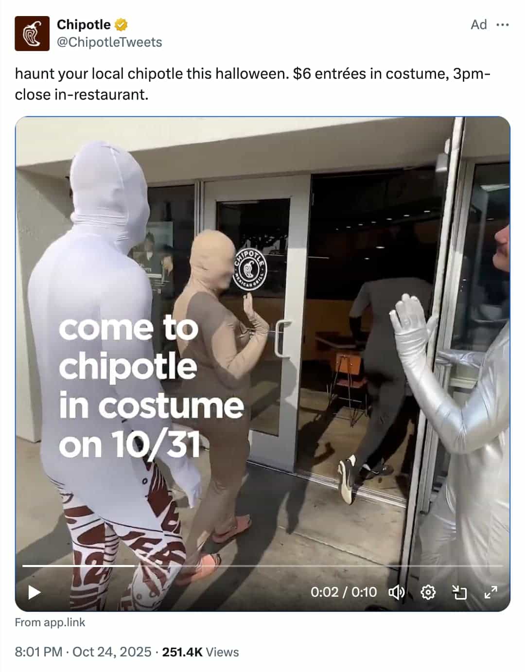 Promoted X post from Chipotle of people in Halloween costumes entering the restaurant