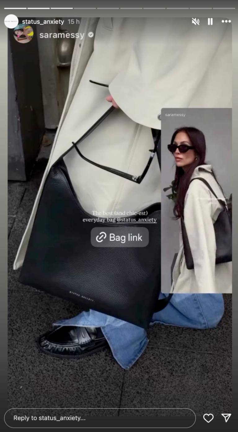 Status Anxiety Instagram Story that reposts a UGC testimonial of a handbag from its range, along with a link to the bag.