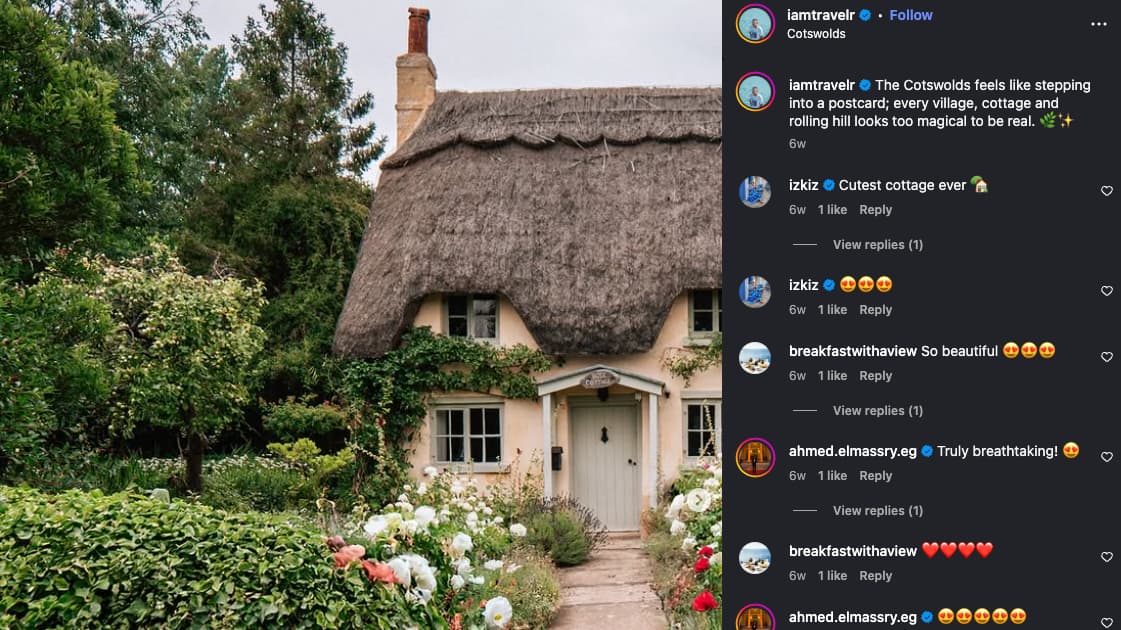 A picturesque cottage with a thatched roof and blooming garden in the Cotswolds, England, representing the kind of heritage travel imagery luxury influencer Umit Yoruk shares.