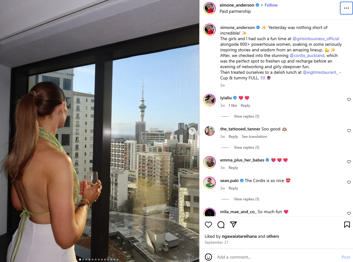 An Instagram post by New Zealand lifestyle influencer Simone Anderson at a window in the Cordis hotel