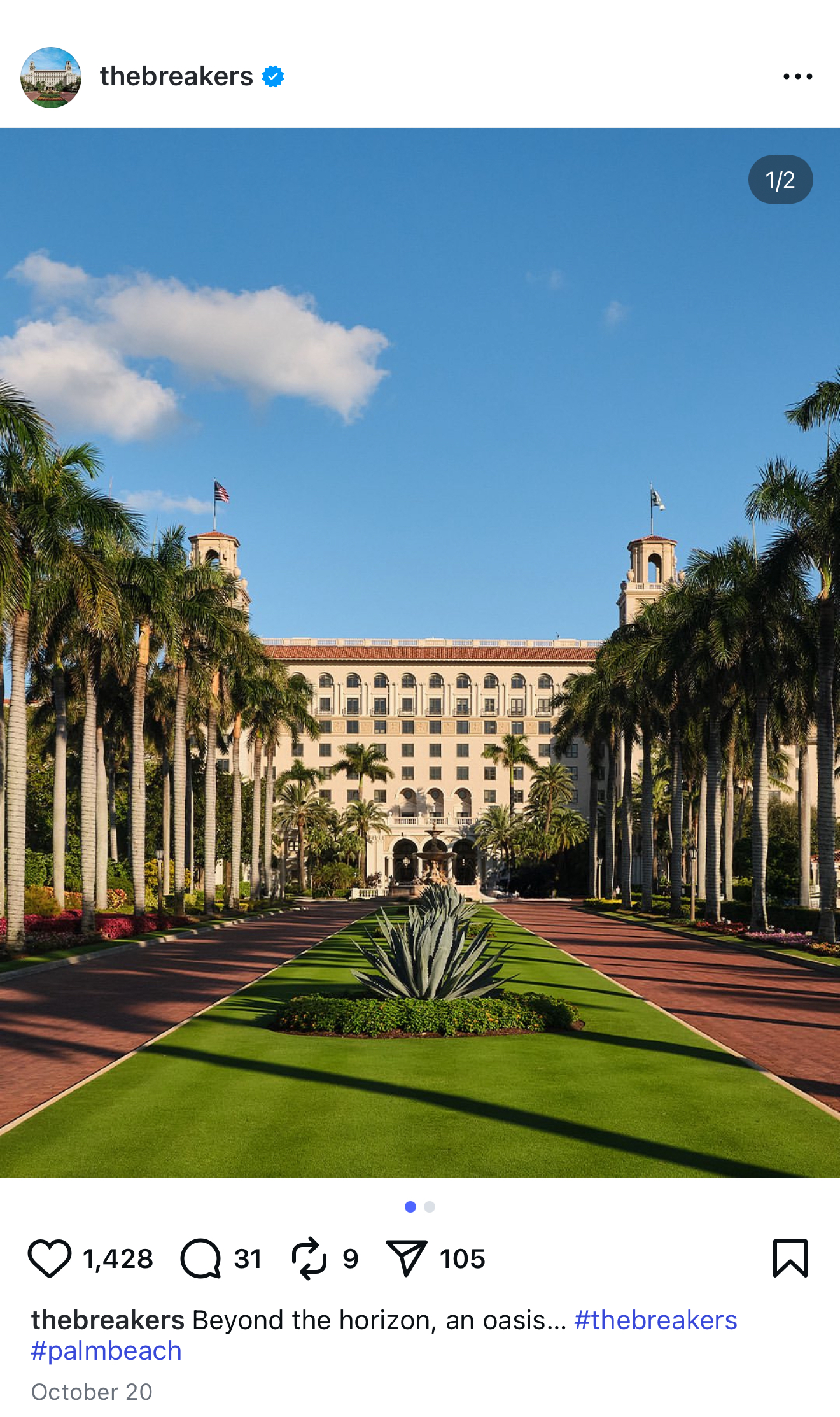 The Breakers hotel, lined with palm trees