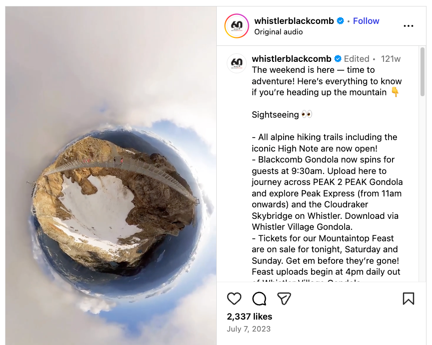 A bird’s-eye view of a hiking bridge over mountains
