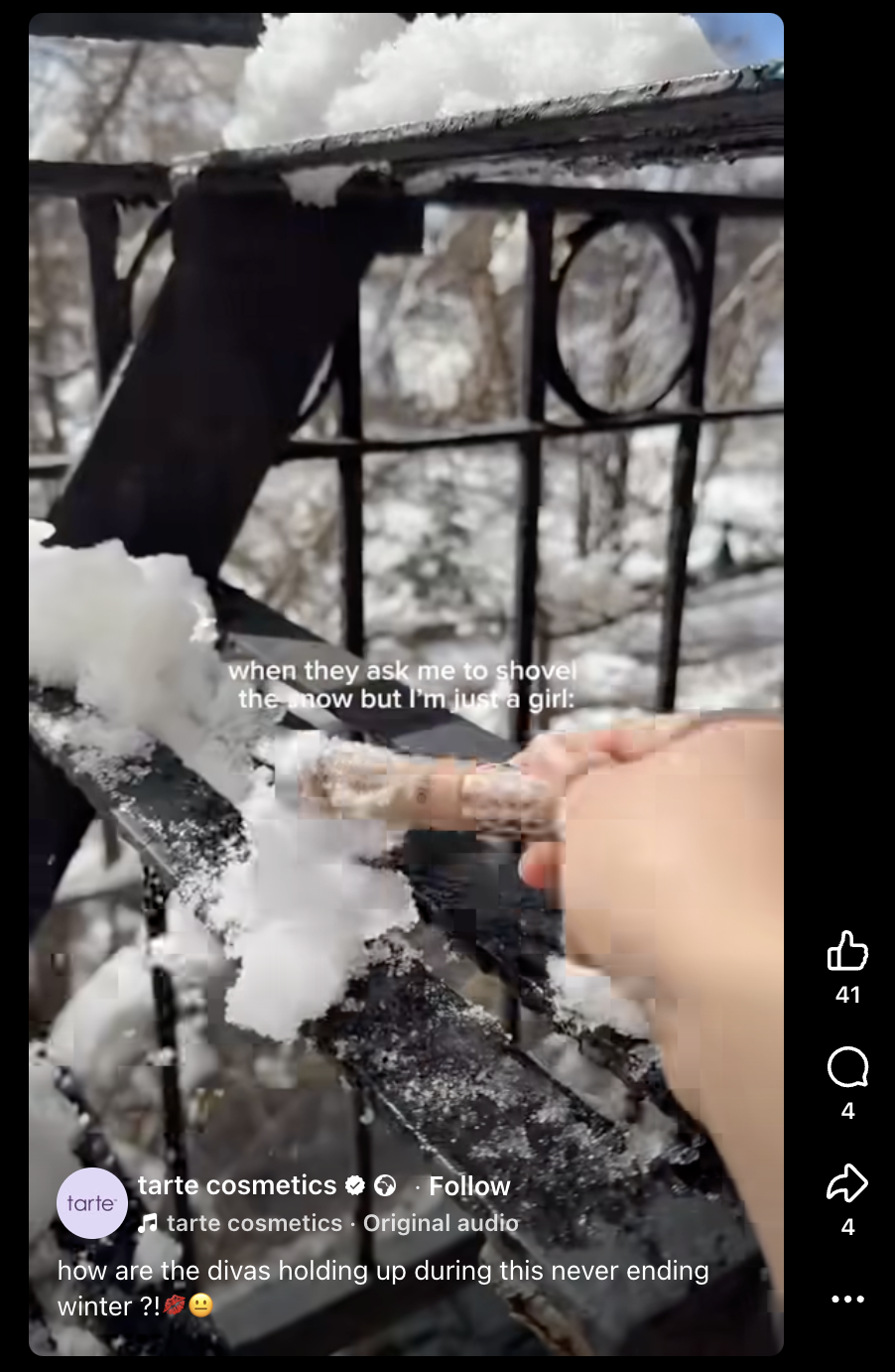 A lo-fi Reel from Tarte showing a person brushing snow off a balcony using their Shape Tape concealer.