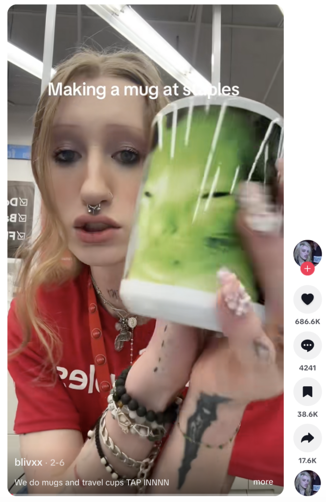A TikTok video from Oblivion where she shows viewers how to create a custom mug at Staples