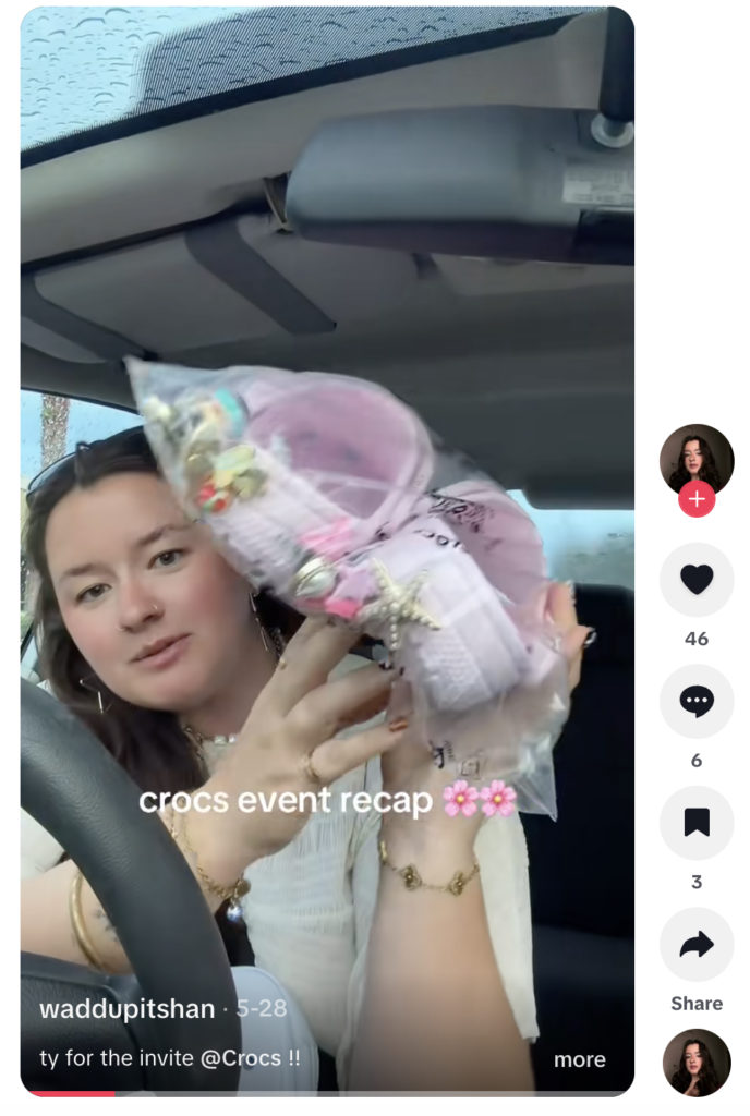 A creator sharing all of her Crocs swag after a brand event